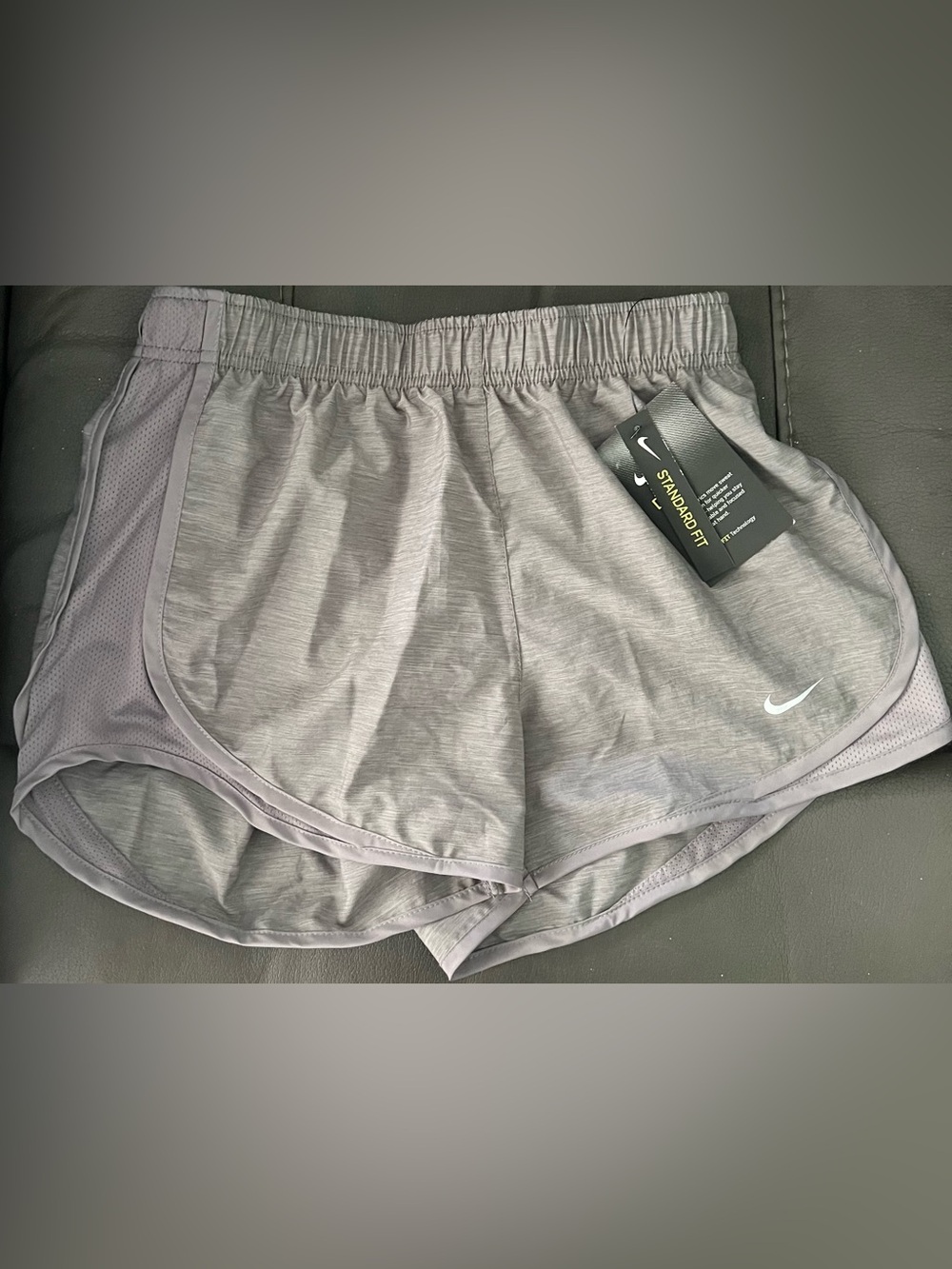 Nike Women’s Light Gray dri fit running shorts